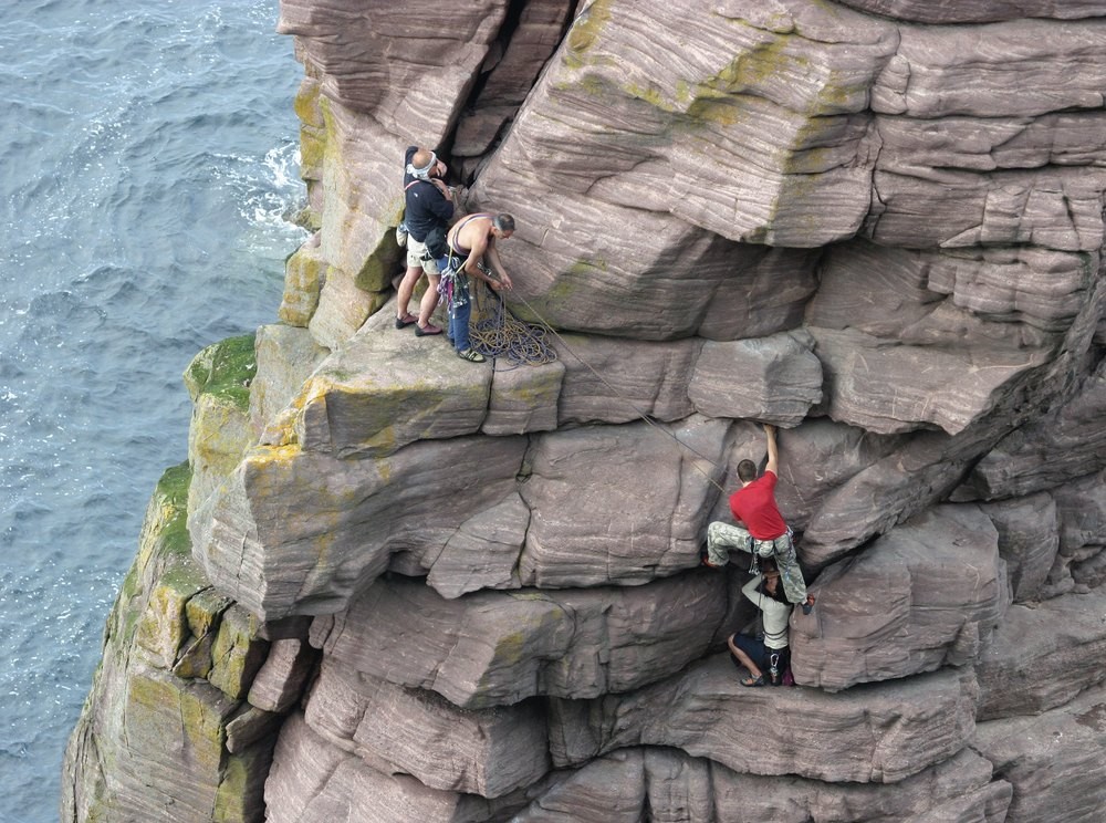 1536 climbers accending the old man of stoer in the scottish highlands