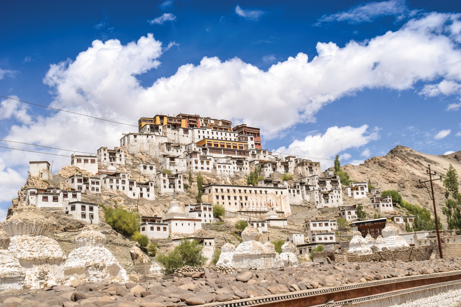 Stone buildings built into hill, Himalayan Mountains