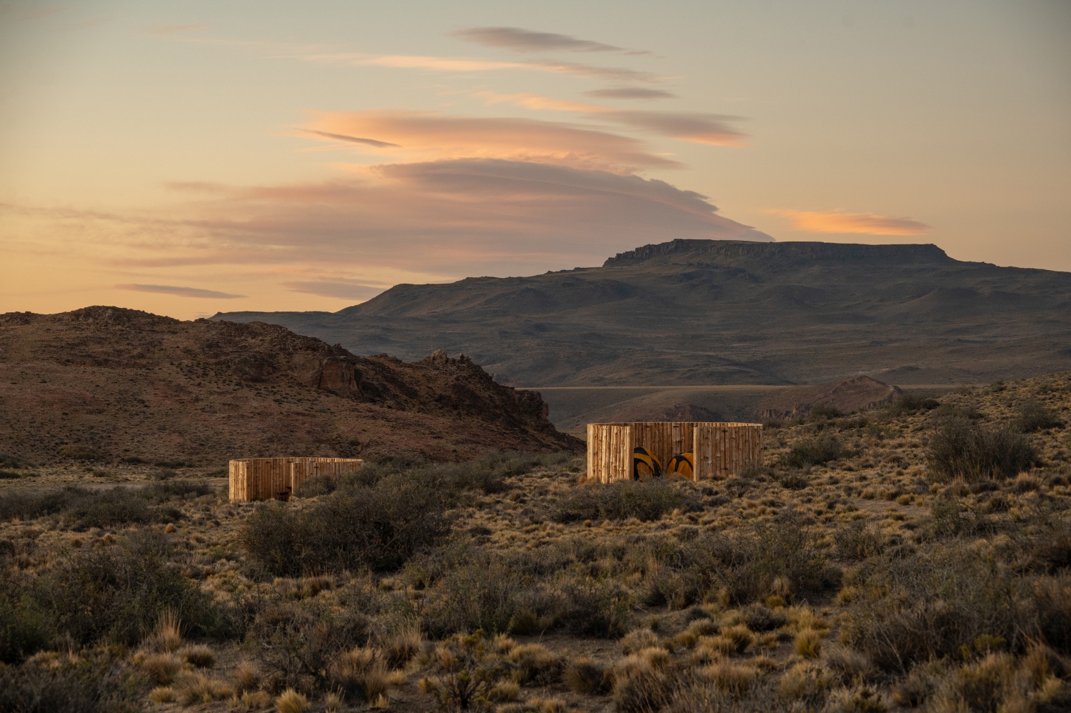 Wooden primitive camping area amongst hills, Patagonia